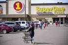 The parking lot of a Super One in Superior was full on Monday afternoon, even after the mayor advised residents to avoid shopping as newly confirmed c