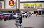 The parking lot of a Super One in Superior was full on Monday afternoon, even after the mayor advised residents to avoid shopping as newly confirmed c