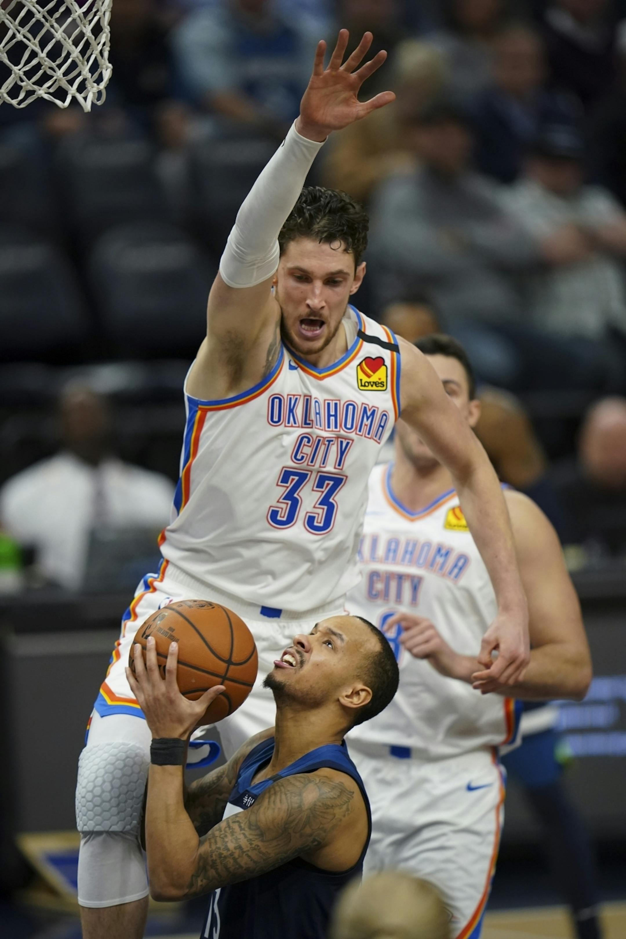 Minnesota Timberwolves guard Shabazz Napier (13) faked a move on Oklahoma City Thunder forward Mike Muscala (33) before taking a third quarter shot. He finished with 16 points.