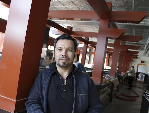 Thom Pham toured his in-progress Azia Market Bar & Restaurant at 26th Street and Nicollet Avenue S., where he hopes to open by late April.