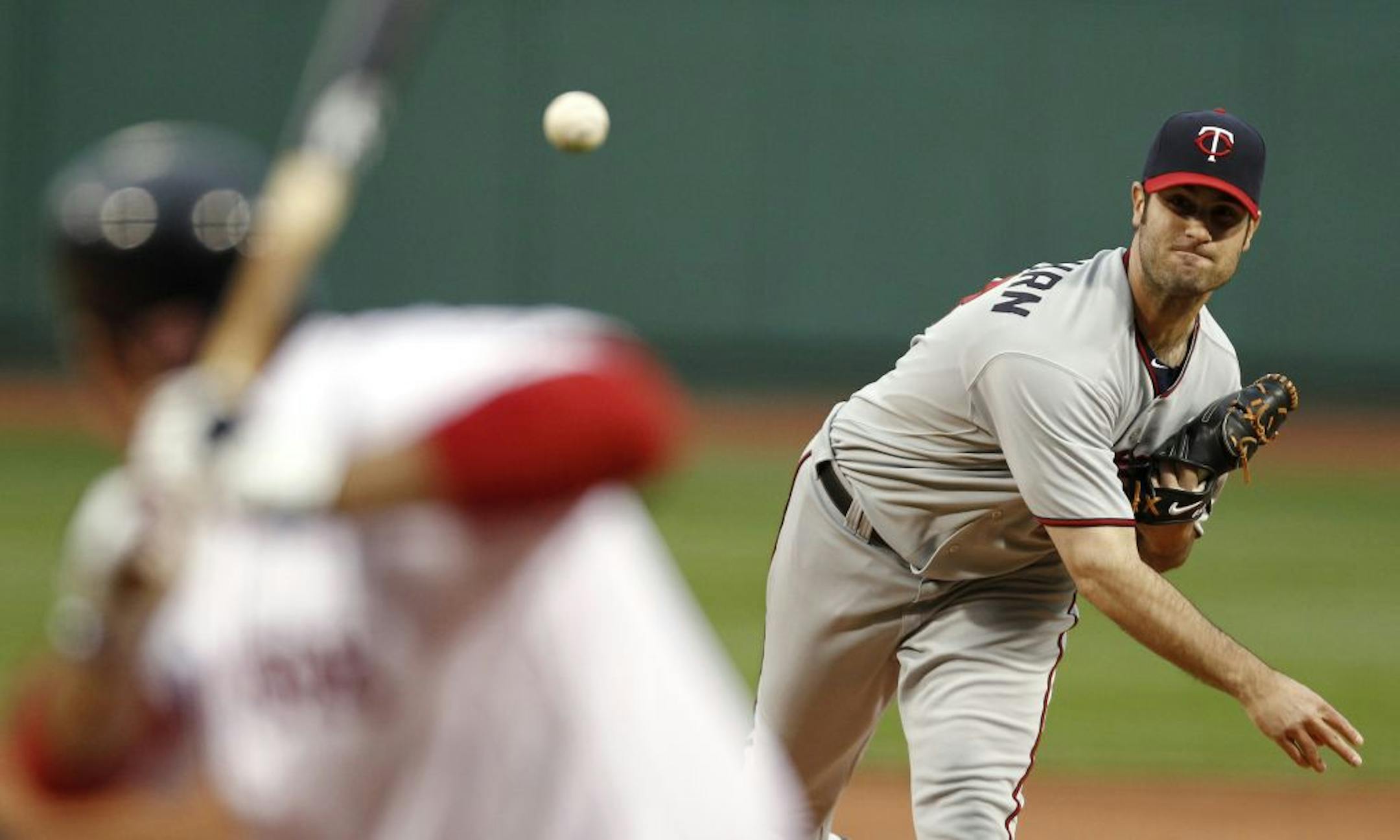 Minnesota Twins starting pitcher Nick Blackburn delivers to a Boston Red Sox during the first inning of a baseball game at Fenway Park in Boston on Monday, May 9, 2011.