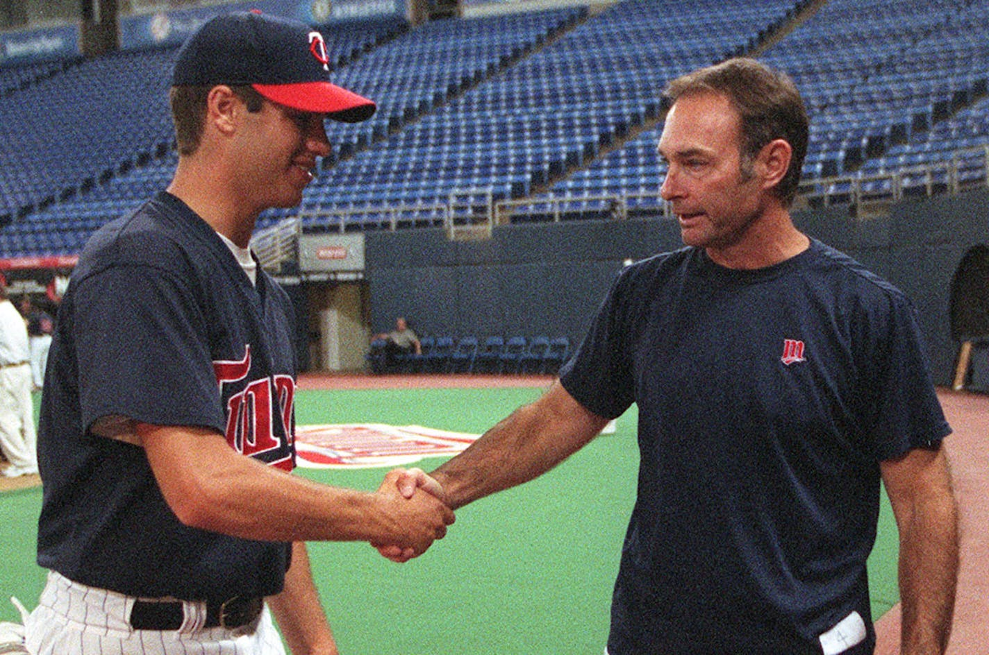 Paul Molitor, right, and Joe Mauer shortly after Mauer was drafted by the Twins.