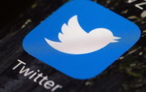 FILE- This April 26, 2017, file photo shows the Twitter icon on a mobile phone, in Philadelphia. Twitter reports earnings Thursday, Feb. 8, 2018. (AP 