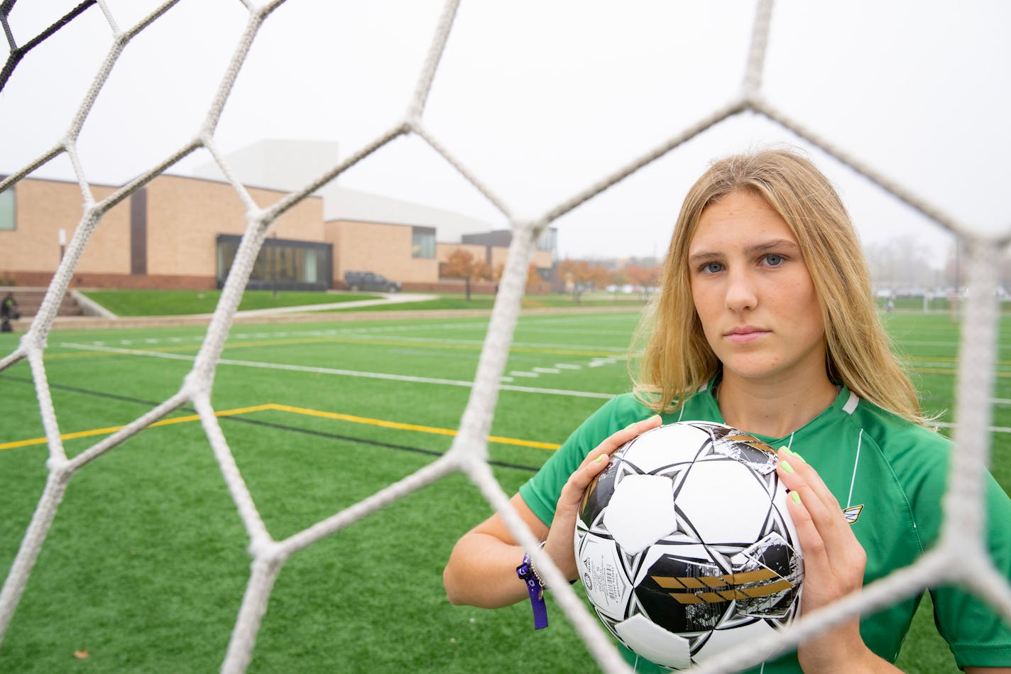 Edina midfielder Izzy Engle, the girls soccer Metro Player of the Year, posed for a portrait. Thursday, Oct. 26, 2023, at Edina High School in Edina, Minn. Engle is the Star Tribune Girls Soccer Metro Player of the Year. ]