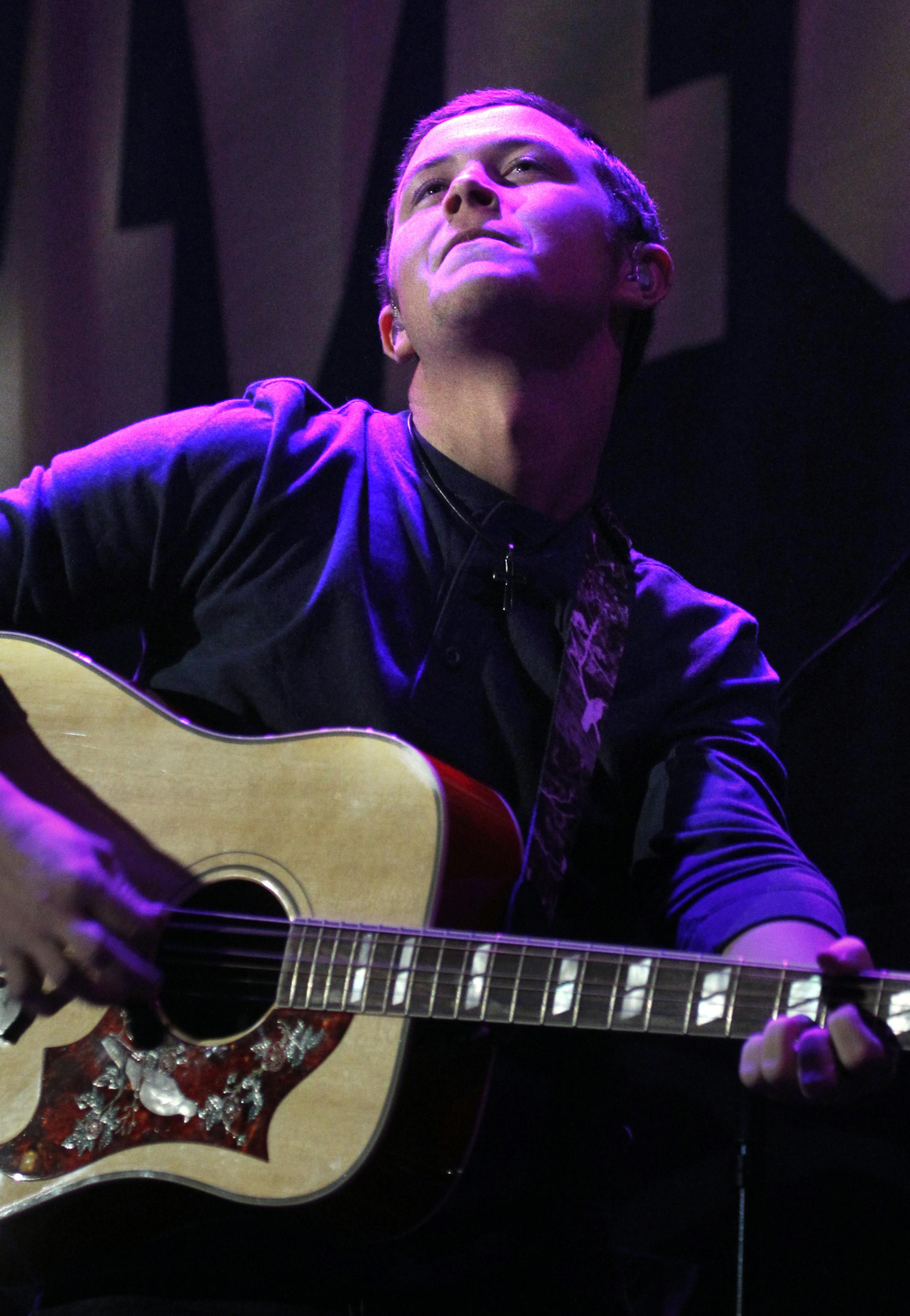 Scottie McCreery took the stage to open for the Brad Paisley, Virtual Reality Tour Saturday night at the Xcel Center.[ TOM WALLACE ‚Ä¢ twallace@startribune.com _ Assignments # 20021406A_ January 14, 2011_ SLUG: paisley0115_ EXTRA INFORMATION: Scotty McCreery‚Äôs debut album, Clear As Day, has been certified platinum for sales of more than 1 million in just three months after its release.In addition, he was named No. 1 on Billboard magazine‚Äôs l