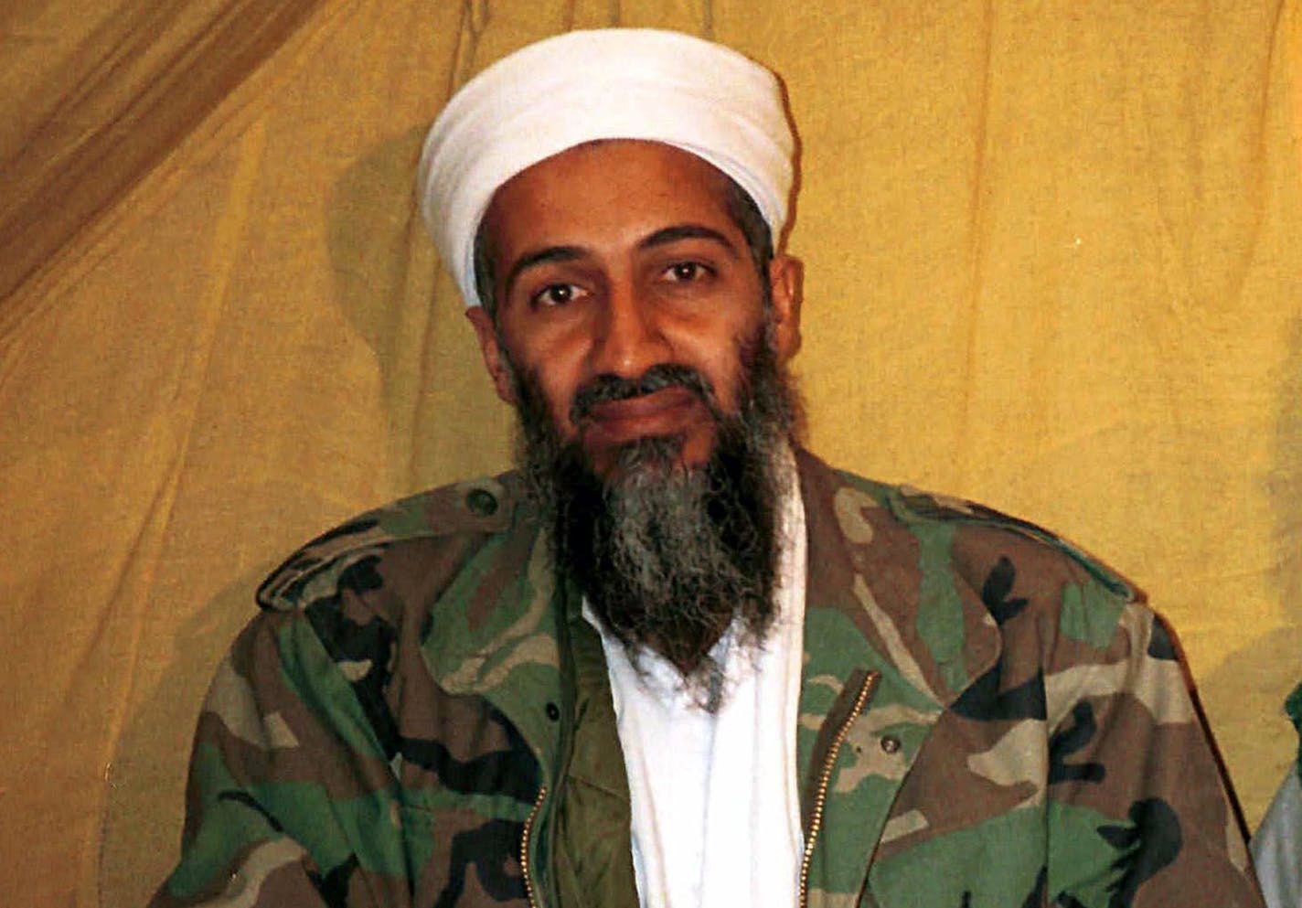 FILE - This undated file photo shows al Qaida leader Osama bin Laden in Afghanistan. Osama bin Laden's spokesman and son-in-law has been captured by U.S. intelligence officials, officials said Thursday, in what a senior congressman called a "very significant victory" in the ongoing fight against al-Qaida. A Jordanian security official confirmed that al-Ghaith was handed over last week to U.S. law enforcement officials under both nations' extradition treaty. He declined to disclose other details