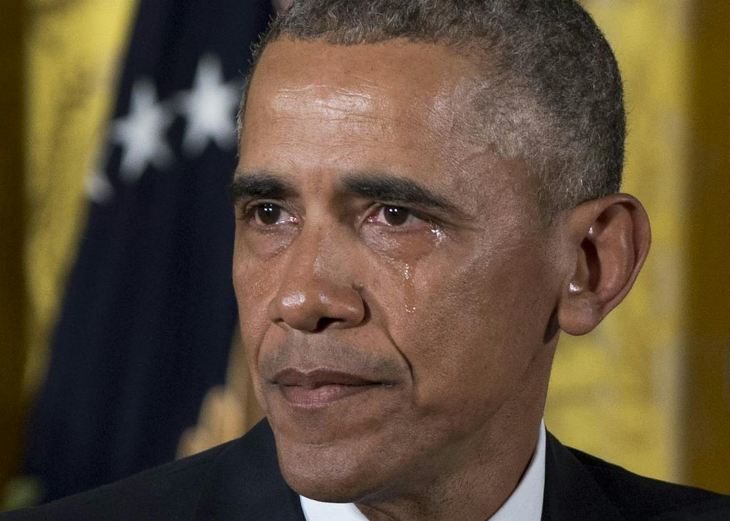 A tear rolled down President Obama's face as he paused in the East Room of the White House in Washington, Tuesday, Jan. 5, 2016, while he spoke about steps his administration is taking to reduce gun violence.