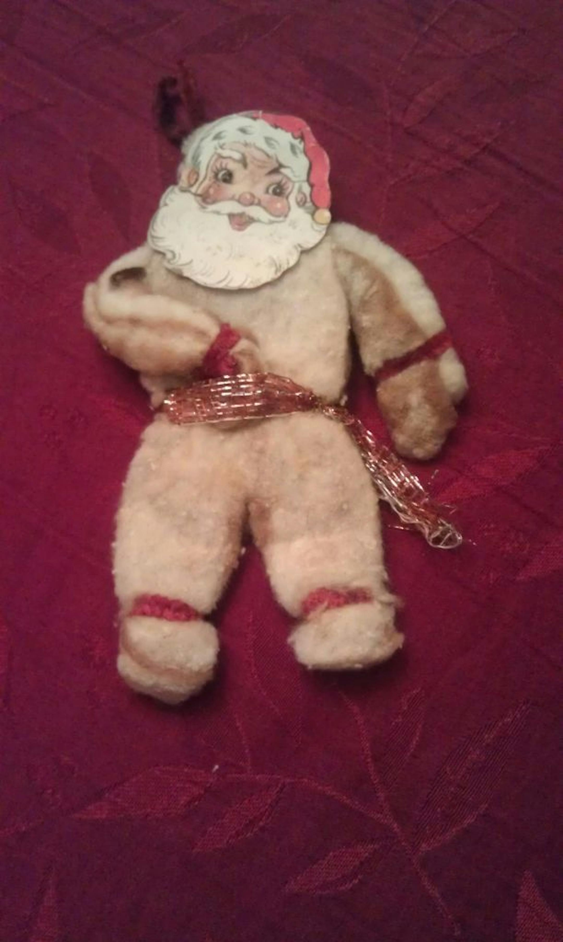 Santa with scorch marks from big bulbs of yesteryear, Geri Johnson