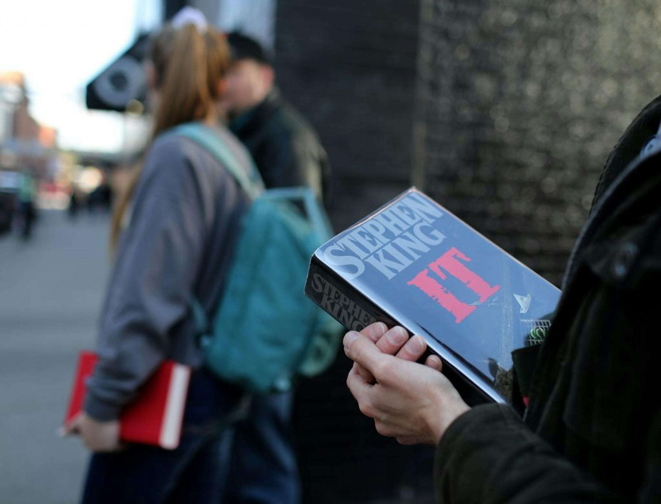 The Rock Bottom Remainders--including literary giants Stephen King, Amy Tan, Dave Barry and other writers--kicked off the Wordplay Festival Friday, May 10, 2019, at First Avenue in Minneapolis, MN. Here, fans held books from their favorite authors, hoping to get an autograph as they arrived at First Avenue before the concert. Between band members, they've published more than 150 titles and sold more than 350 million books.