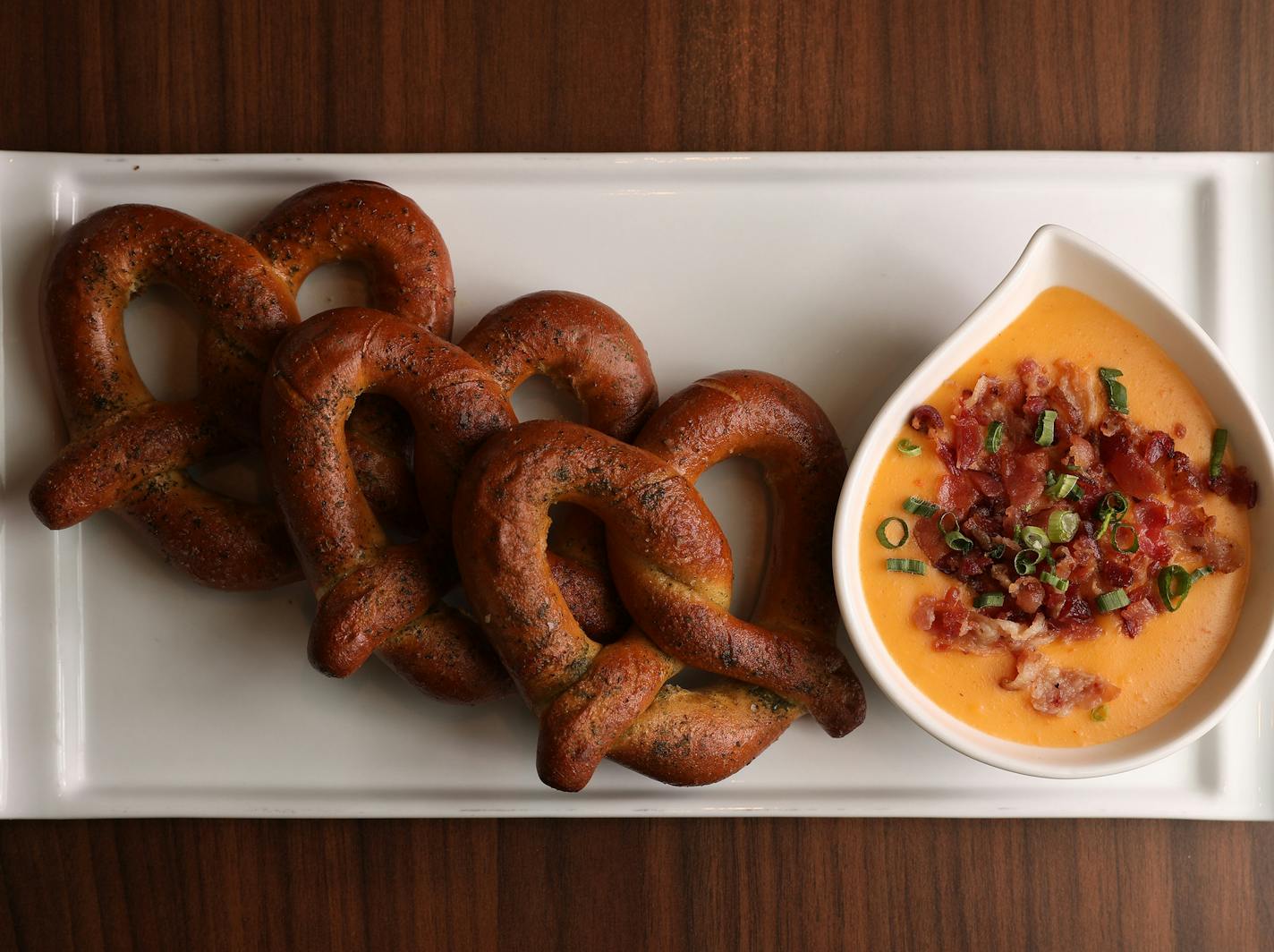 Pictured is the Summit beer cheese pretzels taken during a sneak preview of the new food concepts being unveiled at Target Field. ] ANTHONY SOUFFLE &#xef; anthony.souffle@startribune.com Members of the media and select season ticket holders were given a sneak preview of the new food concepts being unveiled for this baseball season Thursday, March 30, 2017 at Target Field in Minneapolis.