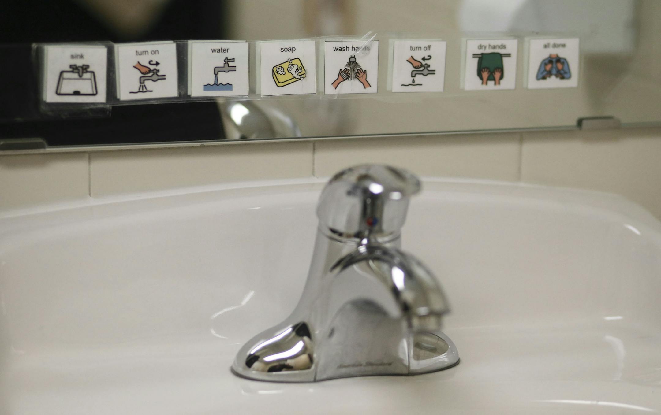 Local designer A.J. Paron-Wildes, whose son is autistic, had helped to design the space at Fraser Eden Prairie and seen Wednesday, Oct. 23, 2014, in Eden Prairie, MN.One of several bathrooms at Fraser with visual cues on hand washing.