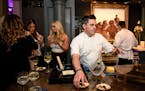Chef Gavin Kaysen of Spoon and Stable in Minneapolis and Bellecour in Wayzata prepared hors d'oeuvres for guests.