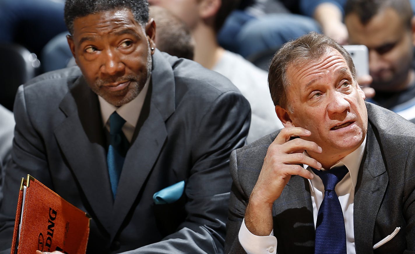 Timberwolves coaches Sam Mitchell and Flip Saunders late in a game last season. Mitchell will take over coaching duties while Saunders undergoes treatments for cancer.