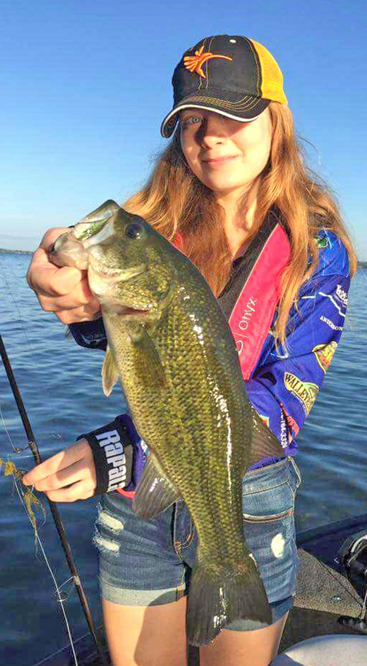 Lexi Ruggles, a member of the Brainerd High School fishing team holds a nice bass she caught during a 2017 tournament on Gull Lake. Her coach, Jason Bahr, is part of an effort to gain official backing for high school bass fishing from the Minnesota State High School Leage. (Photo supplied by Jason Bahr)