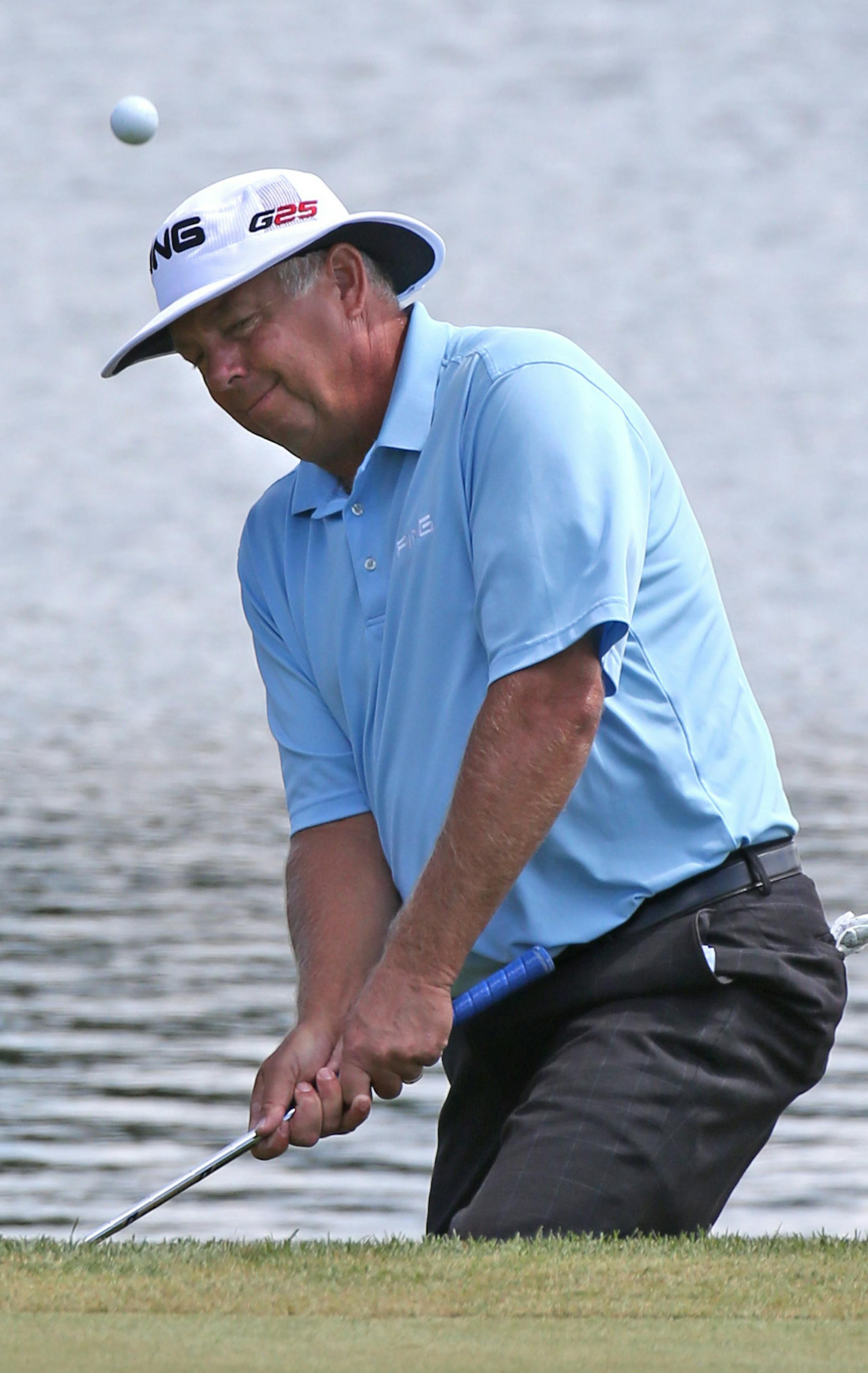 Kirk Triplett hit the ball on the 18th hole green, during 2nd round action at the 3M Championship at the TPC in Blaine, MN., on 8/3/13.] Bruce Bisping/Star Tribune bbisping@startribune.com Kirk Triplett/roster.