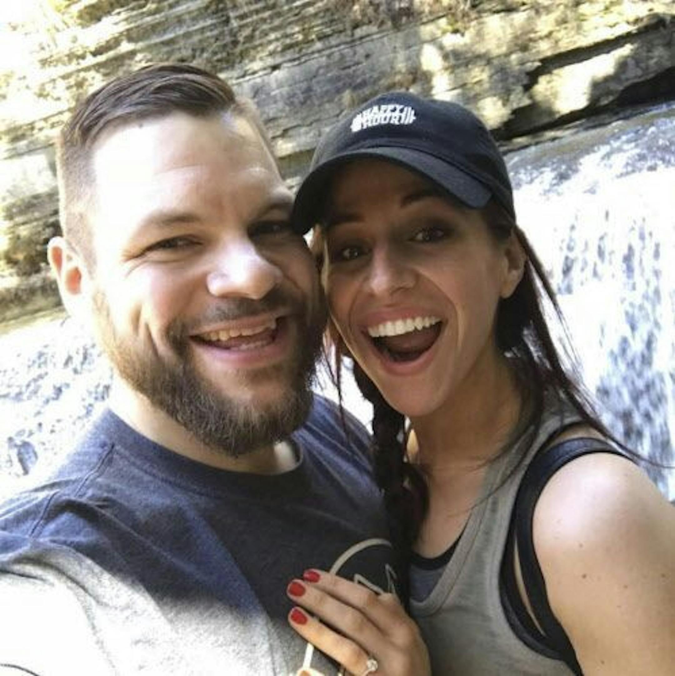 In this undated photo provided by Ronnie Brower, Brower and his fiancee' Andrea Masella pose for a photo. The couple, who bonded over their weight loss journeys, losing a total of 578 pounds, will marry on Saturday, March 13, 2017.