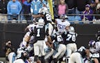 Panthers running back Jonathan Stewart (28) dove over the goal line for a touchdown against the Vikings during the second half Sunday.