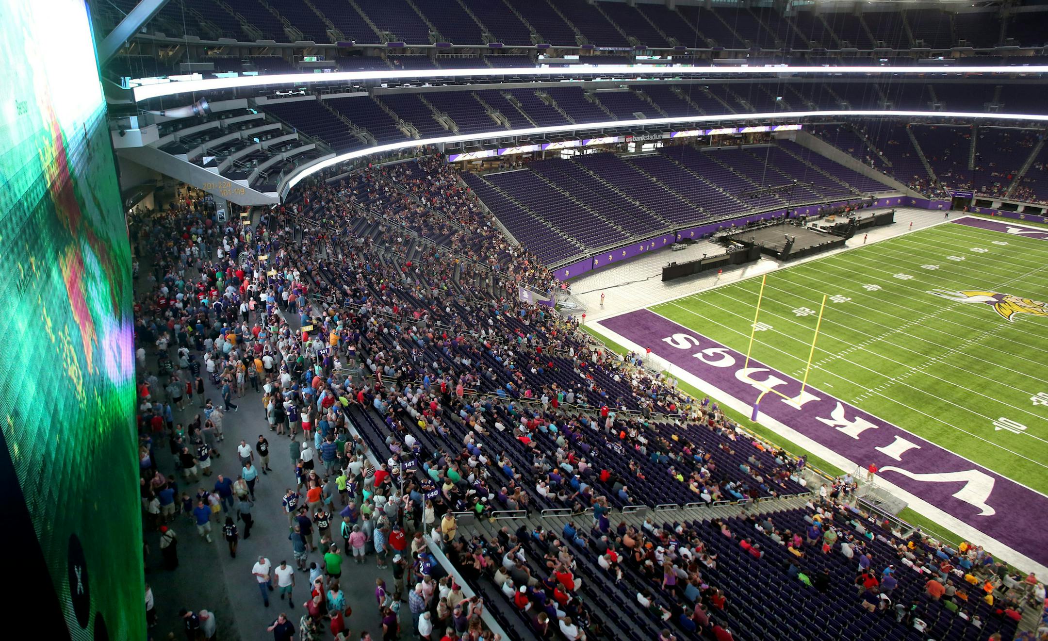 A large crowd was on hand for the public opening at the U.S. Bank Stadium as the current radar of a fast moving storm was visible Saturday, July 23, 2016, in Minneapolis, MN.](DAVID JOLES/STARTRIBUNE)djoles@startribune Thousands of people expected at U.S. Bank Stadium open house. We see what they think. It runs 9-5, but we'll aim to go in late morning.