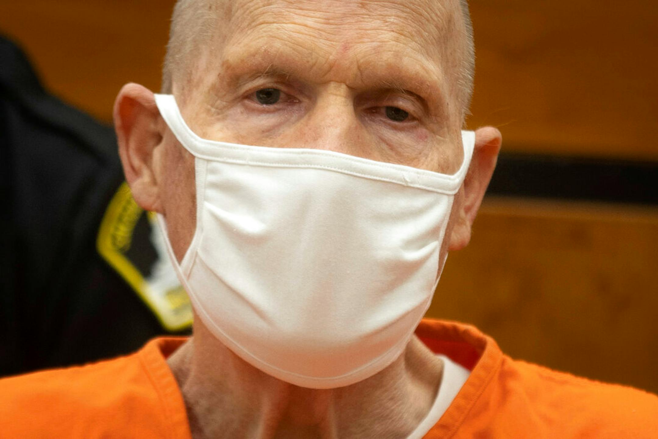 Joseph James DeAngelo looked away from the podium as victims made statements during the first day of victim impact statements at the Gordon D. Schaber Sacramento County Courthouse on Tuesday, Aug. 18, 2020, in Sacramento, Calif.