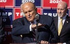 Trump attorney Rudy Giuliani spoke to the media at a press conference held in the back parking lot of landscaping company on Nov. 7, 2020, in Philadel