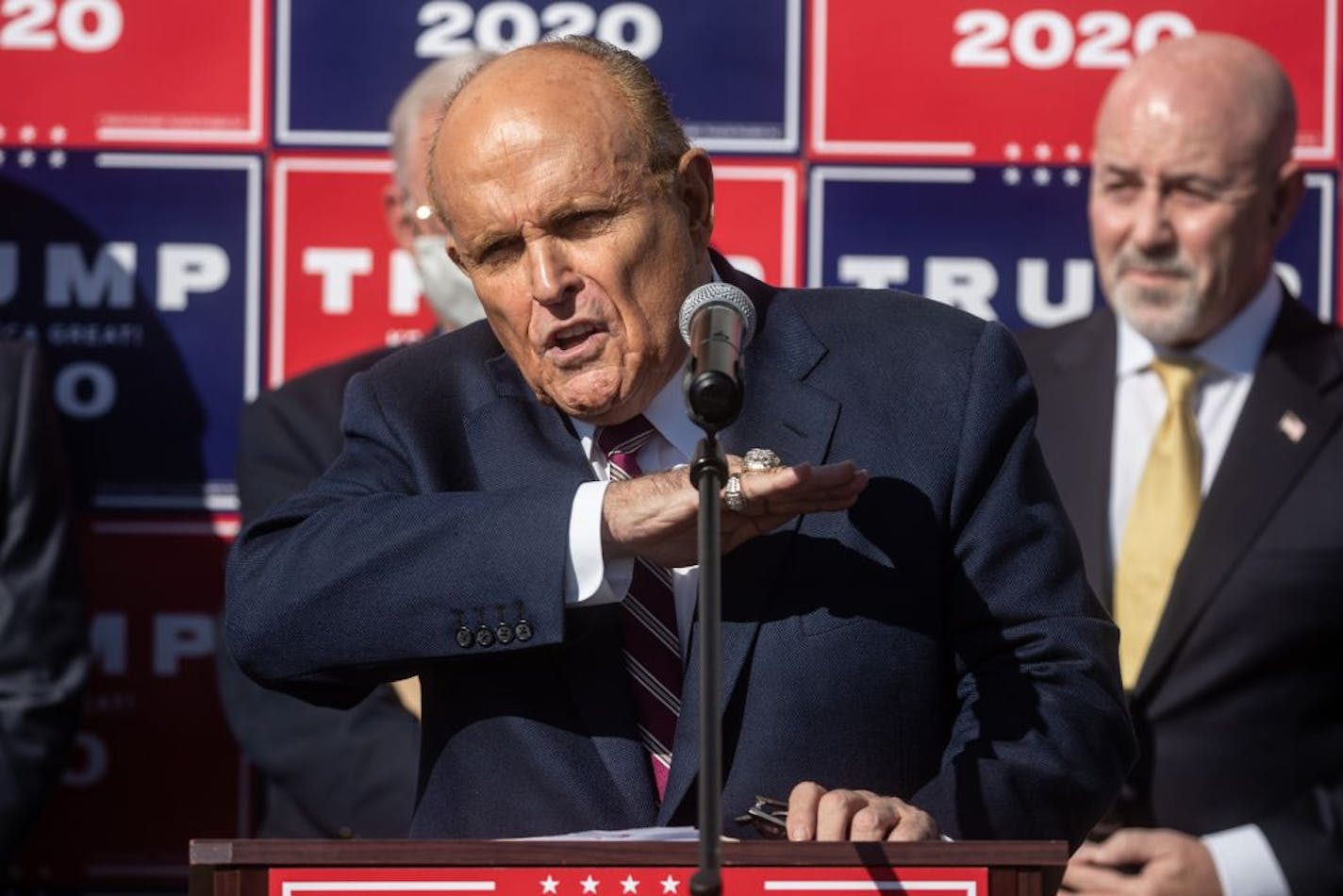 Trump attorney Rudy Giuliani spoke to the media at a press conference held in the back parking lot of landscaping company on Nov. 7, 2020, in Philadelphia.