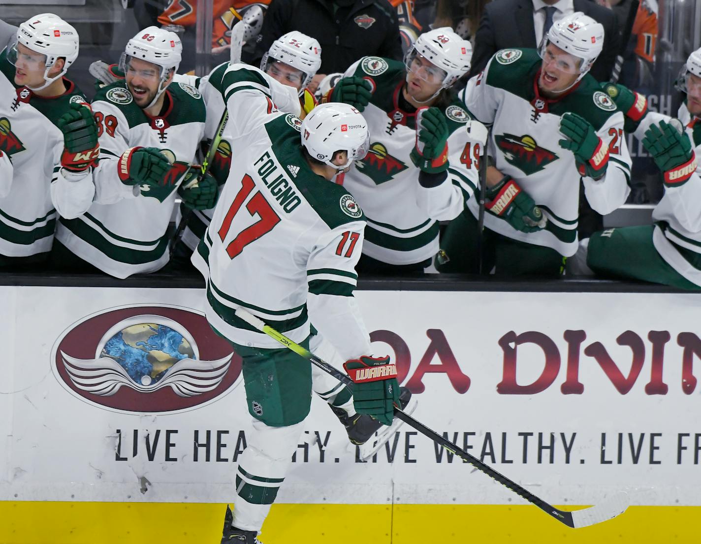 Minnesota Wild left wing Marcus Foligno (17) celebrates after scoring against the Anaheim Ducks in the final minute of an NHL hockey game Friday, Oct. 15, 2021, in Anaheim, Calif. The Wild won 2-1. (AP Photo/John McCoy)