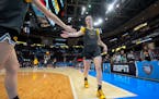 Caitlin Clark, a two-time college women's basketball player of the year at Iowa, is expected to be the No. 1 overall pick in the WNBA draft.