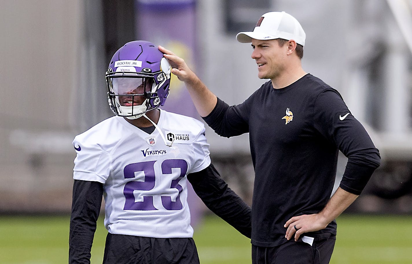 Head Coach Kevin O'Connell and Andrew Booth Jr. on the practice field during the Vikings rookie minicamp at the TCO Performance Center, in Eagan, Minn., on Friday, May 13, 2022. ] Elizabeth Flores • liz.flores@startribune.com