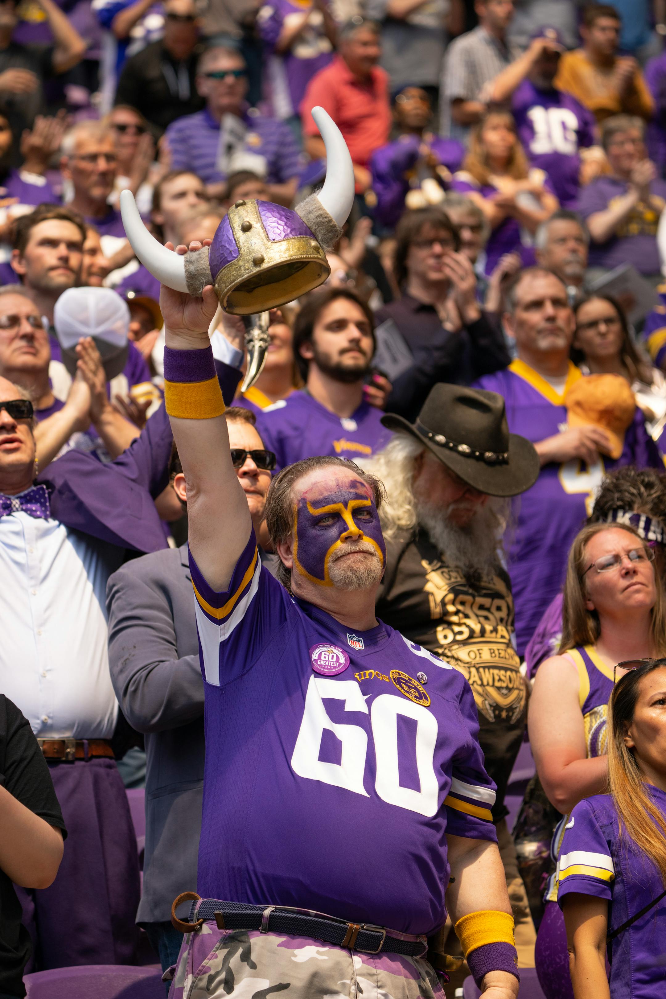 Scott Asplund, aka Sir Skolt, raised his helmet high after the singing of the national anthem.