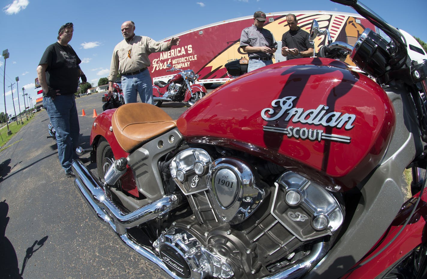 A group of motorcycle fans and potential buyers looked over a batch of Indian motorcycles. ] Indian Motorcycles of the Twin Cities is the 1st dealer in the country to give demonstration rides (todya) on Polaris's new Indian Scout. Rides will be done by 300 Minnesotans all day today. new bike was a hit decades ago, and went away after a bankruptcy. Now it's back. 756823 Indian 20035800A (DAVID BREWSTER/STAR TRIBUNE)