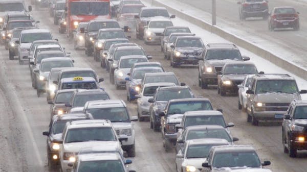 The eastbound lanes of I-394 bog down during the afternoon rush hour on a recent winter day.