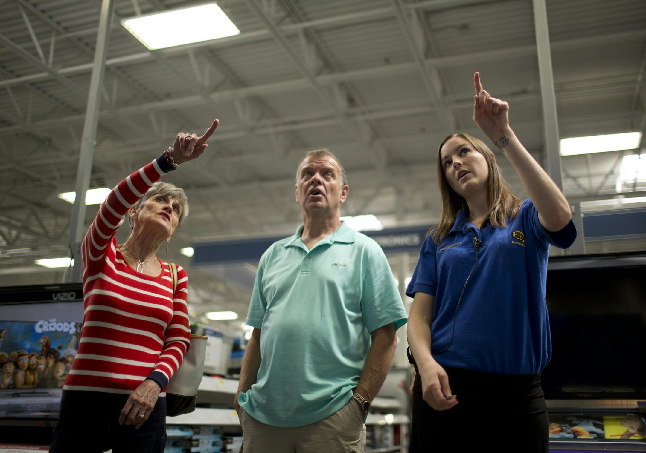 Under new CEO Hubert Joly, Best Buy has made a big push to improve customer service. On the store level, Best Buy has retrained its "Blue Shirts" using techniques developed at its Best Buy Mobile format. Wednesday afternoon, July 31, 2013 in the Best Buy store in Eden Prairie, Minn. Nicole Marshall, a home theater sales consultant, explained the features of various flat screen televisions while answering questions from Barb and Larry Groves of Waconia Wednesday afternoon. ] JEFF WHEELER &#x201a;