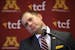Newly named University of Minnesota football coach P.J. Fleck gestured as he described how his new players first looked at him during their initial me