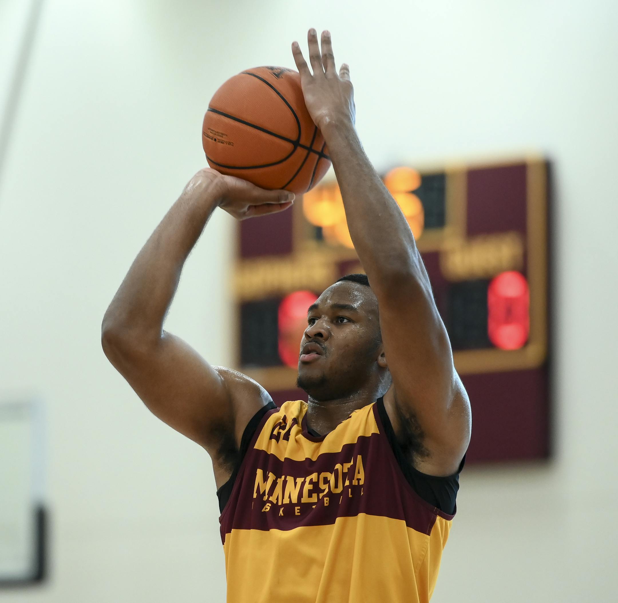 Gophers forward Eric Curry (24) attempted a basket during practice Tuesday. ] Aaron Lavinsky • aaron.lavinsky@startribune.com The Gophers men's basketball team held a practice, as well as a press conference by head coach Richard Pitino, on Tuesday, Sept. 24, 2019 at the University of Minnesota Athletes Village in Minneapolis, Minn.