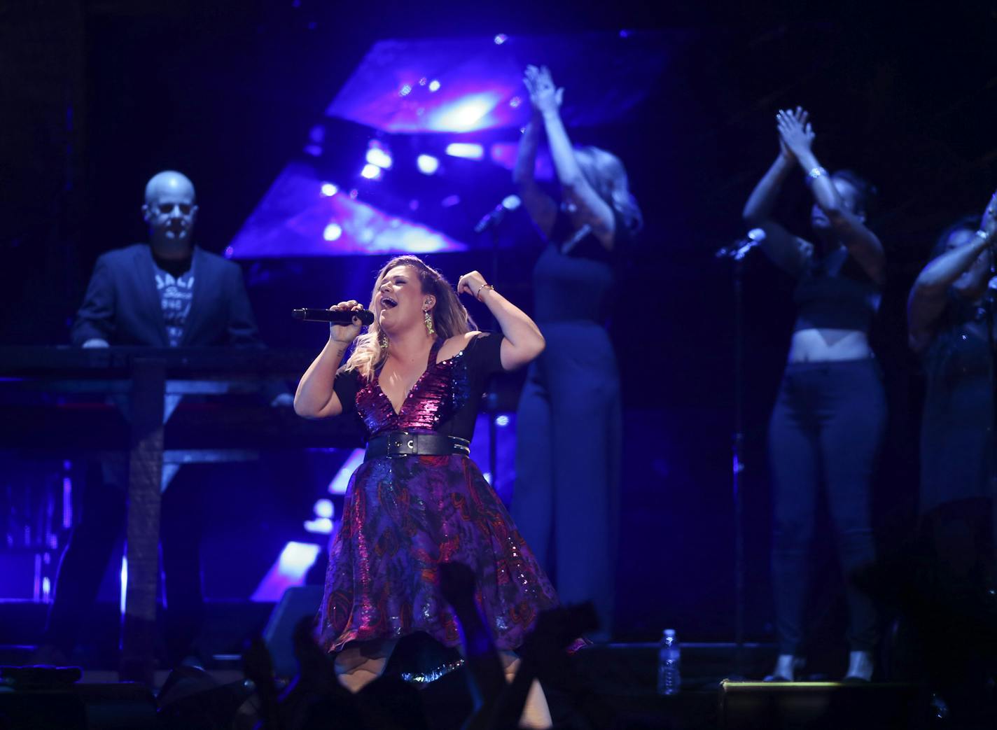 Kelly Clarkson early in her set Tuesday night at Xcel Energy Center. ] JEFF WHEELER &#xef; jeff.wheeler@startribune.com Kelly Clarkson headlined a show at Xcel Energy Center in St. Paul Tuesday night, August 4, 2015. Pentatonix, an a cappella group from Arlington, TX was one of three opening acts,