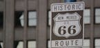This June 21, 2016 photo shows one of the signs along historic Route 66 in downtown Albuquerque, N.M. The National Park Service has partnered with the