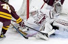 South St. Paul goalie Delaney Norman (37) makes a save in the second period during the Class 1A quarterfinals Wednesday, February 22, 2022, at Xcel En