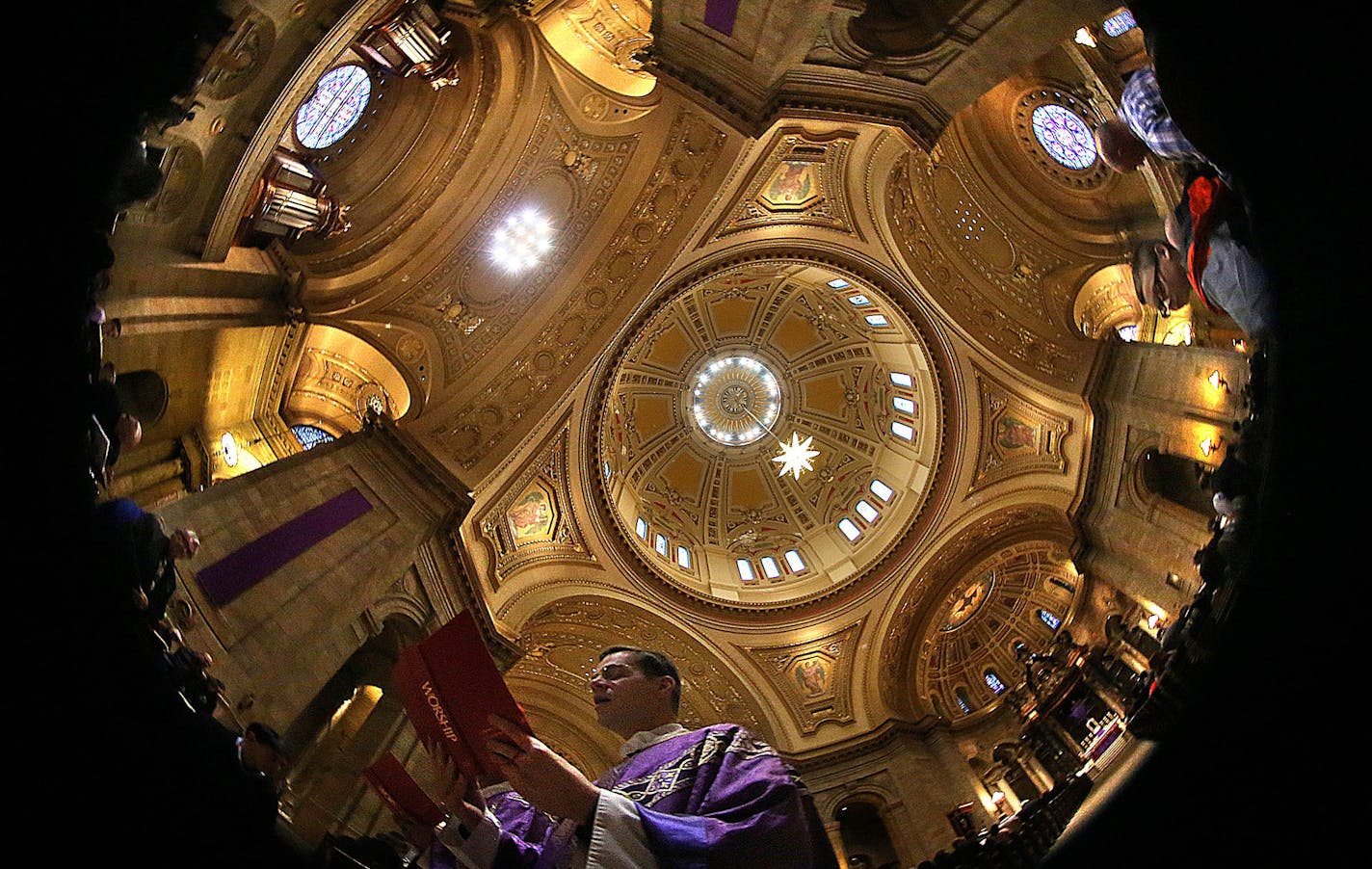 Cathedral of St. Paul Rector Father John Ubel processed from the Sanctuary as the Sunday Mass concluded. ] JIM GEHRZ &#xef; james.gehrz@startribune.com / Minneapolis, MN / March 22, 2015 /9:00 AM - BACKGROUND INFORMATION: On Palm Sunday, the Cathedral of St. Paul, the iconic, domed Catholic church overlooking the city, turns 100 years old. We look at the history of the place, the effort it took to build it and the yearlong events that are planned to mark the centennial.