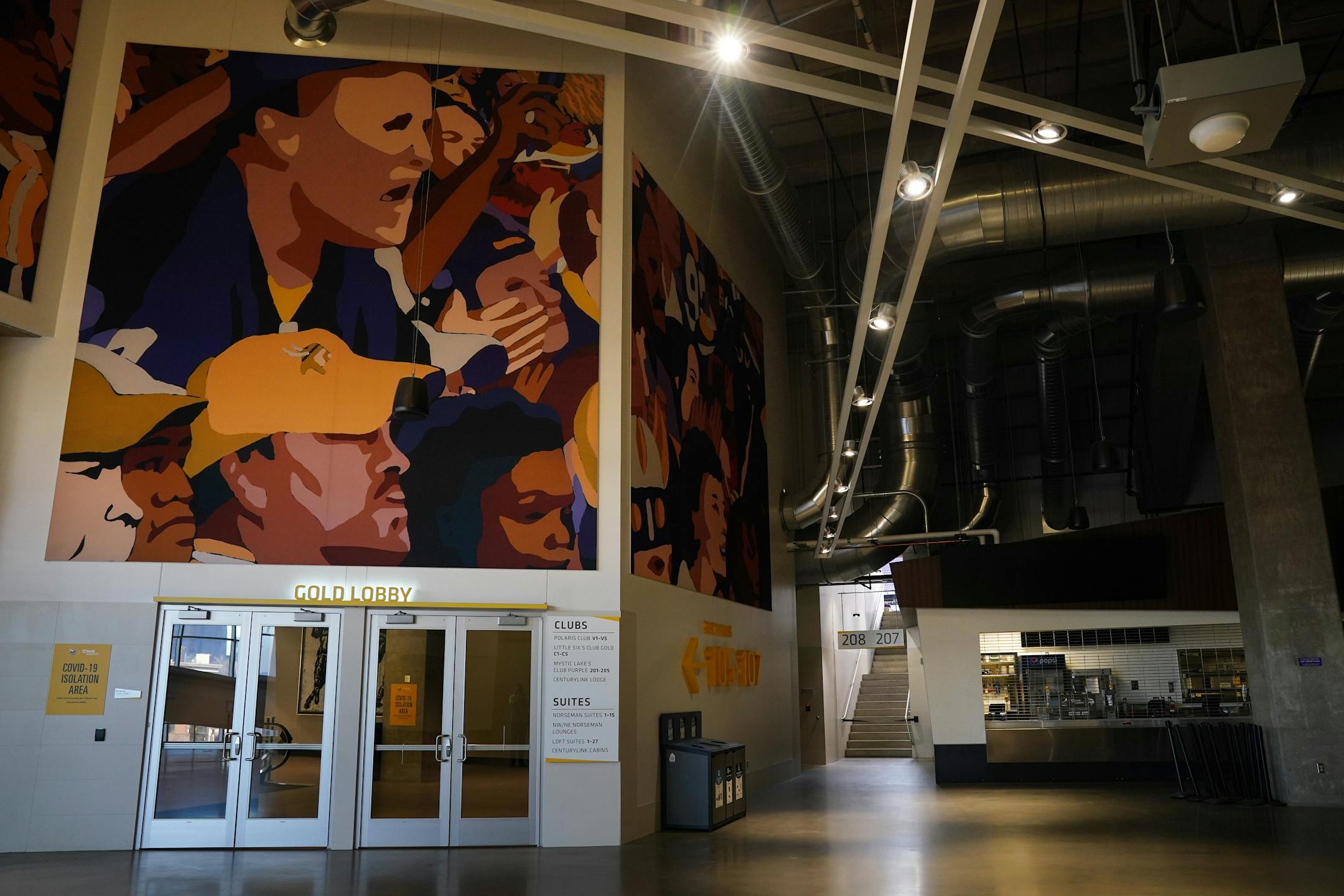 A mural of fans looked out over an empty U.S. Bank Stadium concourse as the Minnesota Vikings and Chicago Bears warmed up without fans in attendance per state regulations meant to slow the spread of COVID-19.