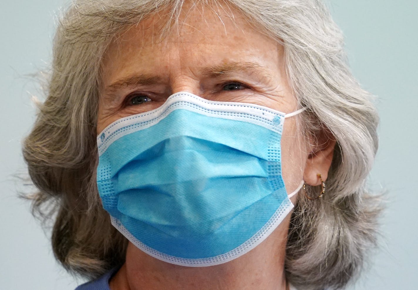 Department of Health Commissioner Jan Malcolm wore a mask as she listened to Gov. Tim Walz announce a statewide mask mandate to help slow the spread of COVID-19 Wednesday. ] ANTHONY SOUFFLE • anthony.souffle@startribune.com Gov. Tim Walz and Lt. Gov. Peggy Flanagan held a press conference to announce a statewide mask mandate to help slow the spread of COVID-19 Wednesday, July 22, 2020 at the Department of Revenue building in St. Paul, Minn. Also in attendance was Department of Health Commissione