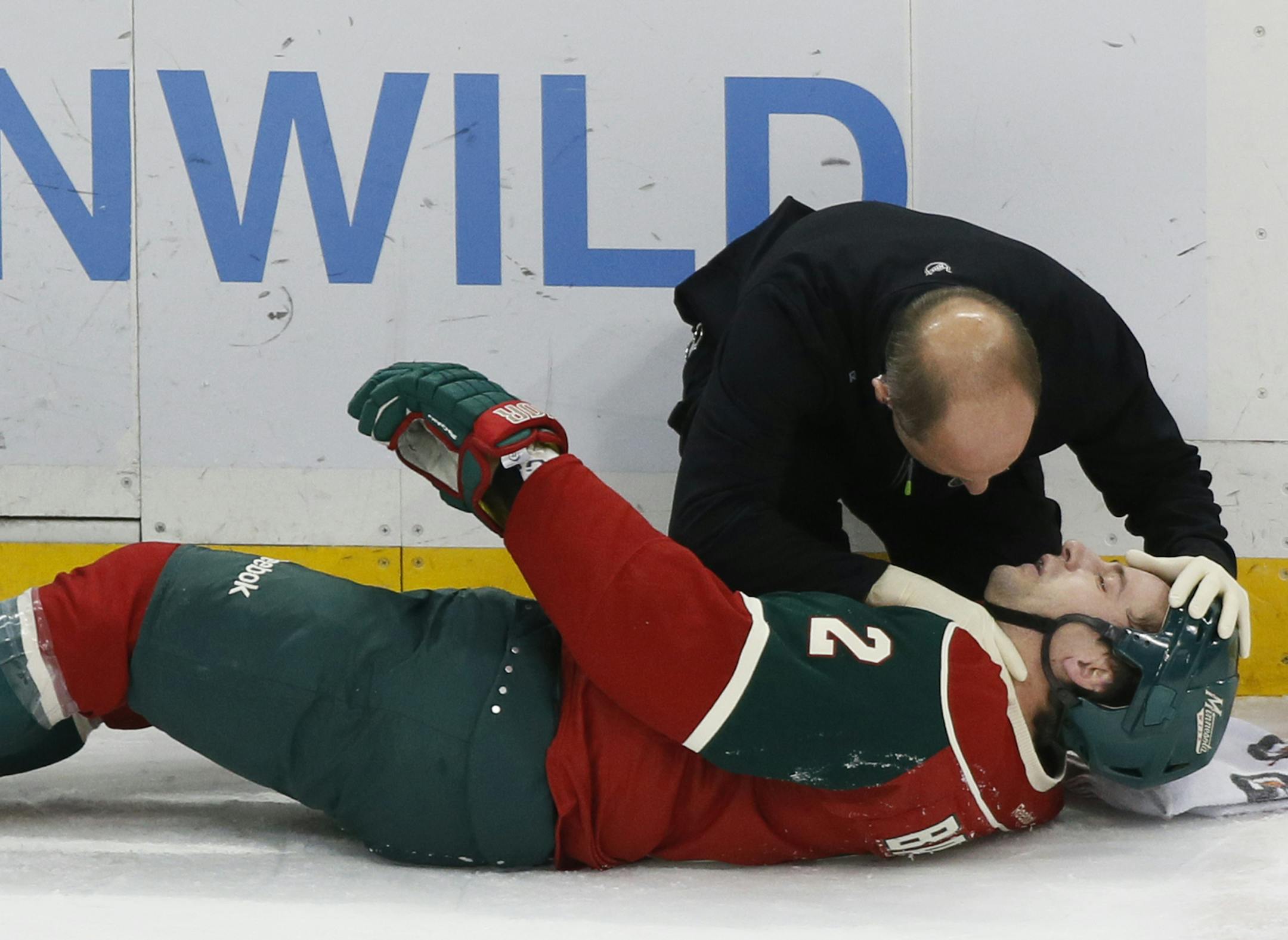 Keith Ballard was injuried in the second period and was helped off the ice.] in the Wild game at the Xcel Center against the New York Islanders.Richard Tsong-Taatarii/ rtsong- taatarii@startribune.com