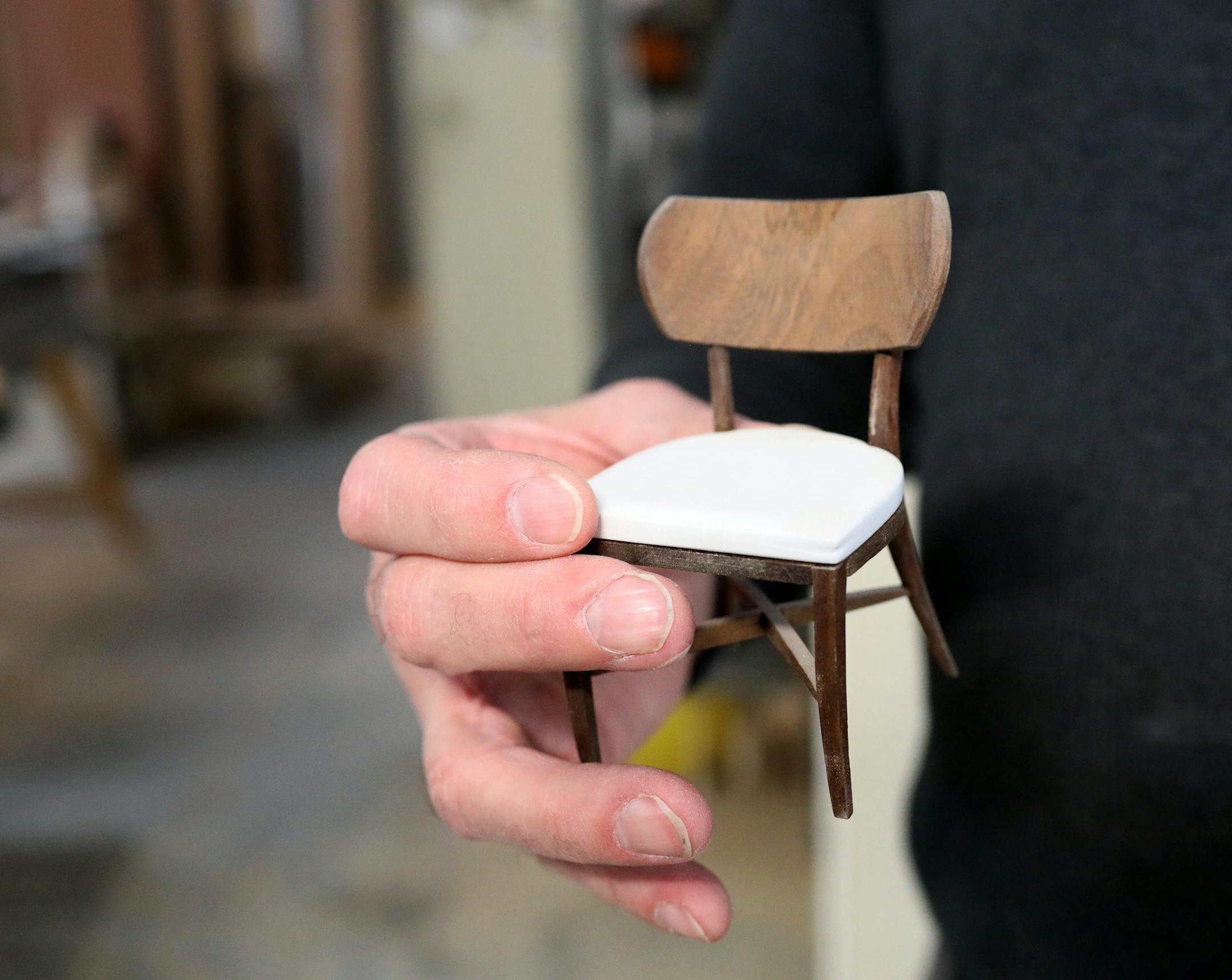 Willette held a miniature model of the Raleigh.