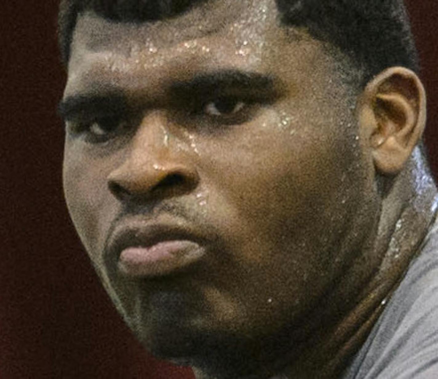 Former Alabama lineman D.J. Fluker, right, works for an NFL official as former Alabama center Barrett Jones, rear left, watches during Alabama's second pro day for NFL scouts, Thursday, April 11, 2013, in Tuscaloosa, Ala. (AP Photo/AL.com, Vasha Hunt) MAGS OUT ORG XMIT: MIN2013041517313409