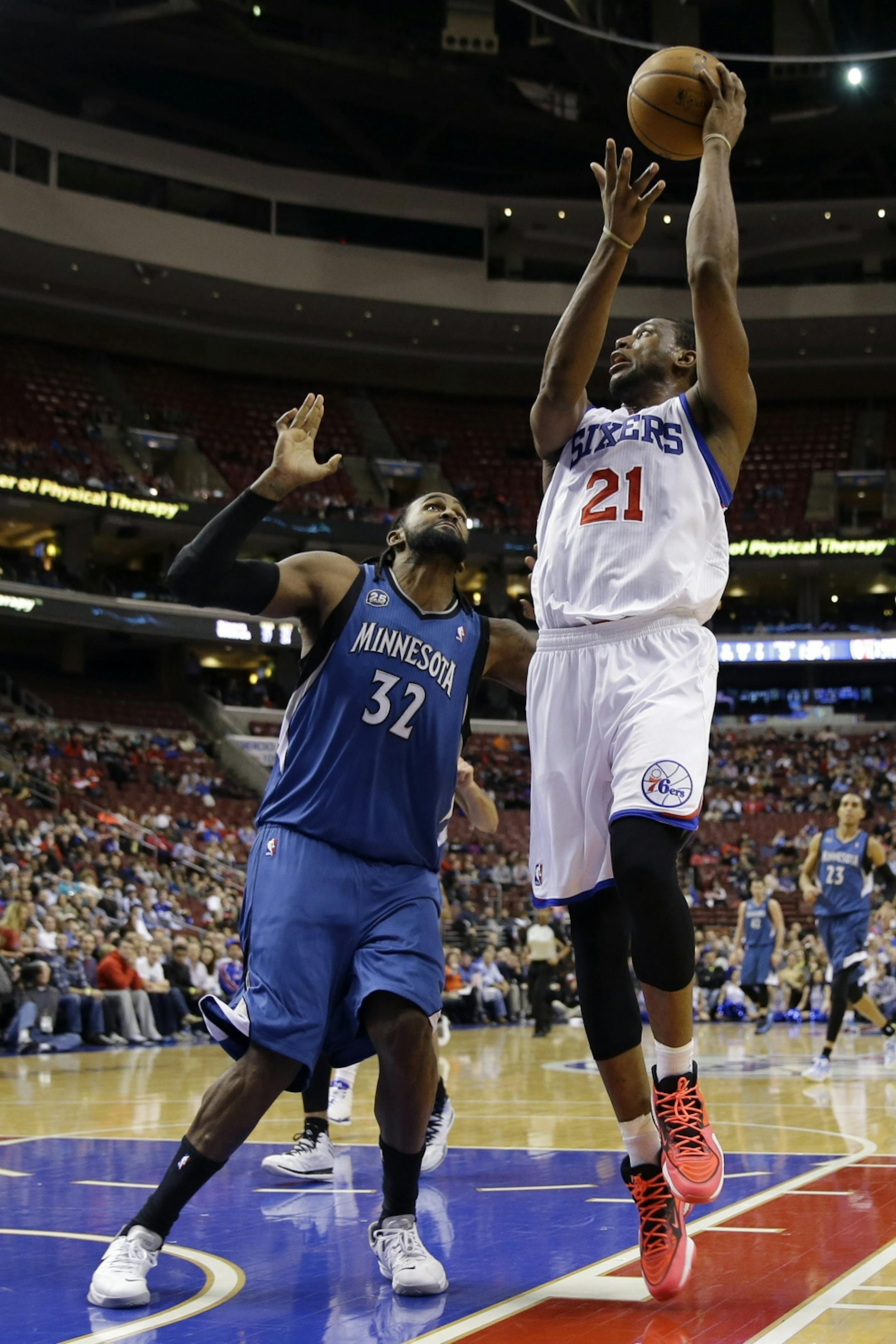 Thaddeus Young, right, goes up for a shot against Minnesota Timberwolves' Ronny Turiaf in January.