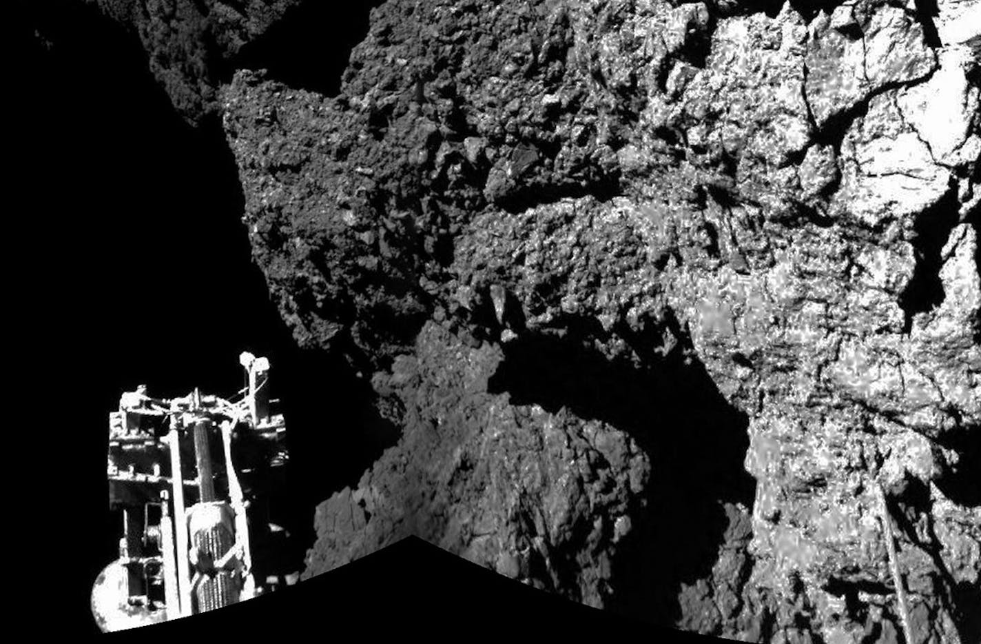 The combination photo of different images taken with the CIVA camera system released by the European Space Agency ESA on Thursday Nov. 13, 2014 shows Rosetta&#x201a;&#xc4;&#xf4;s lander Philae as it is safely on the surface of Comet 67P/Churyumov-Gerasimenko, as these first CIVA images confirm. One of the lander&#x201a;&#xc4;&#xf4;s three feet can be seen in the foreground. Philae became the first spacecraft to land on a comet when it touched down Wednesday on the comet, 67P/Churyumov-Gerasimenk