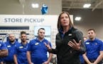 Best Buy CEO Corie Barry, in a 2019 file photo with store employees