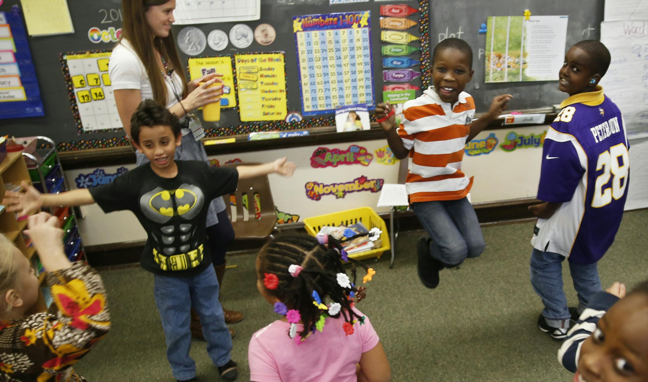In the 1/2 grade class at Jefferson Community School in Minneapolis, teacher Kim Kiedrowski asked her students to jump up and down 50 times as part of an exercise. ]richard tsong-taatarii/rtsongtaataarii@startribune.com