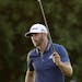 Dustin Johnson reacts after making a birdie on the 18th hole during the final round of the U.S. Open golf championship at Oakmont Country Club on Sund