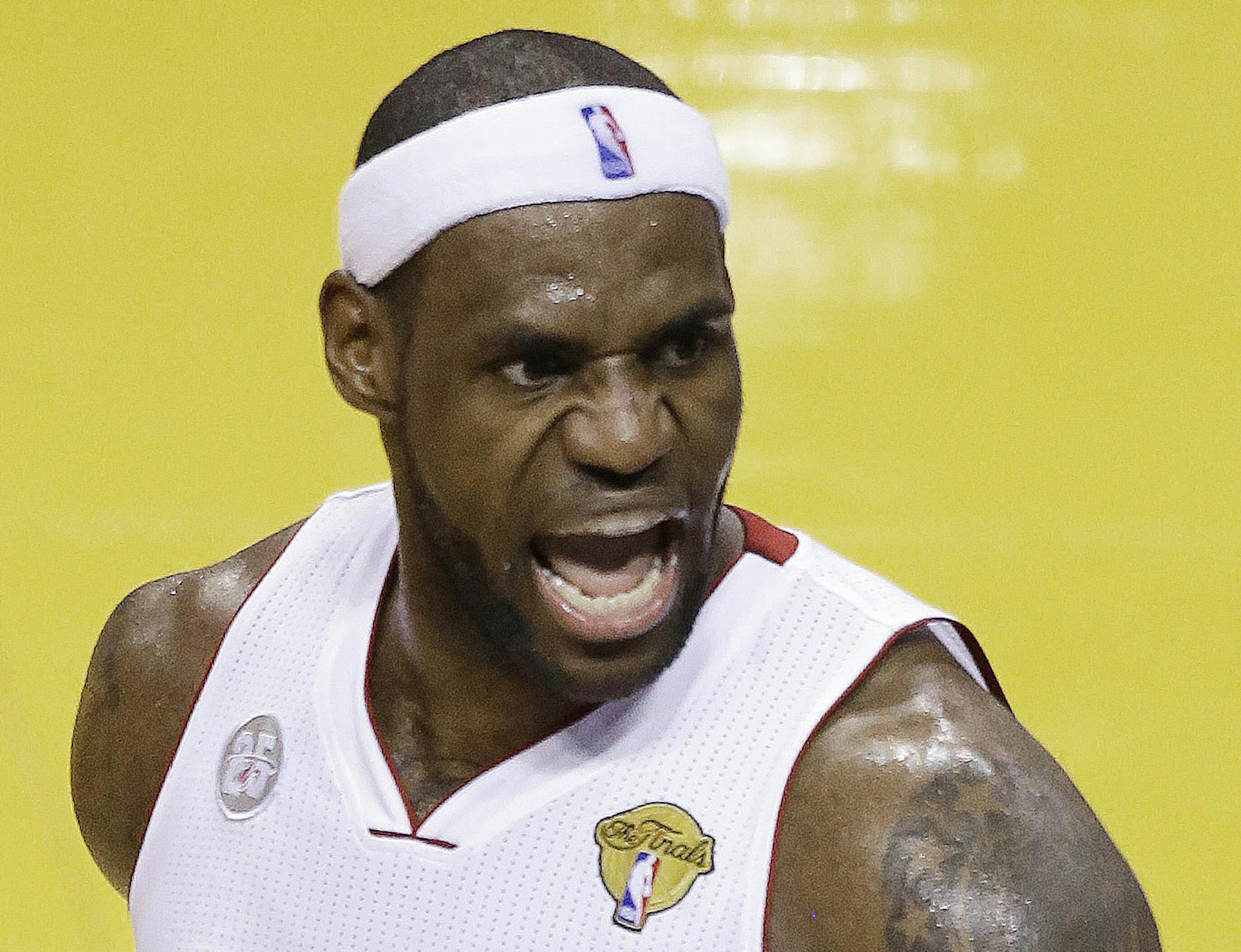 Miami Heat s forward LeBron James (6) reacts after he was fouled during the second half in Game 7 of the NBA basketball championship against the San Antonio Spurs, Thursday, June 20, 2013, in Miami. The Miami Heat won 95-88. (AP Photo/Wilfredo Lee)