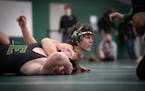 Colton Loween of Mounds View gained an advantage over Lincoln Gentry of Edina during a mid-January meet. Loween is 40-4 at 160 pounds this season.